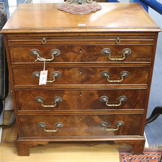 A George III style banded mahogany bachelor chest fitted brushing slide, W.68cm